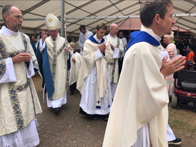 Bishop Philip leaves mass Bishop Philip leaves mass