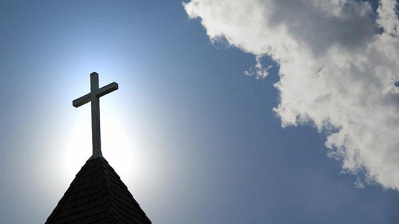 cross-on-top-of-church-blue-sky cross on top of church blue sky