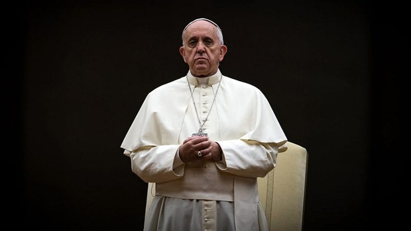 pope francis praying standing