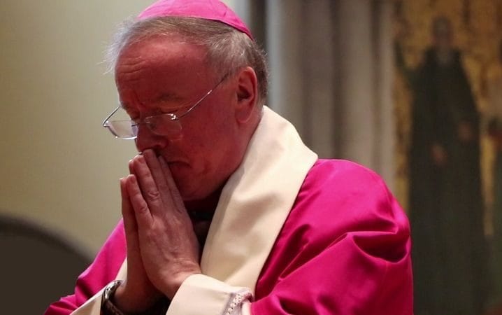 bishop philip praying
