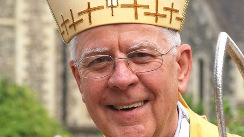 A close up photo of Bishop Crispian. He is smiling while wearing a traditional Bishop Attire.