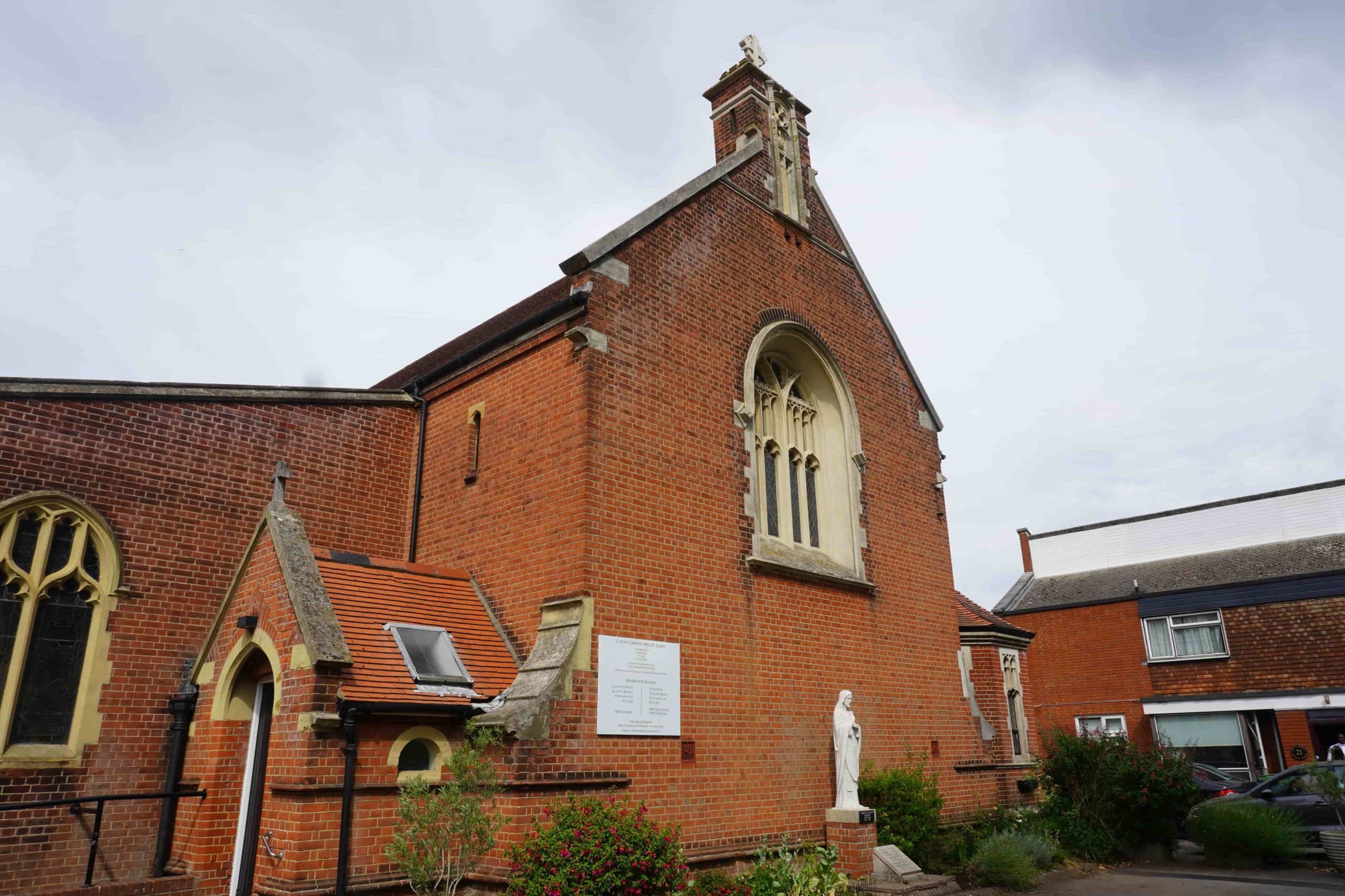 A photo of a brick church from outside.